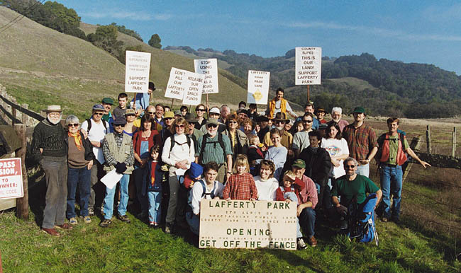 The group of walkers poses in front of Lafferty Park gate.